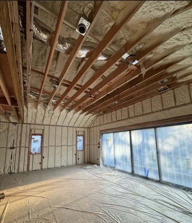Interior walls and ceiling insulated with spray foam during new construction in Miami Beach